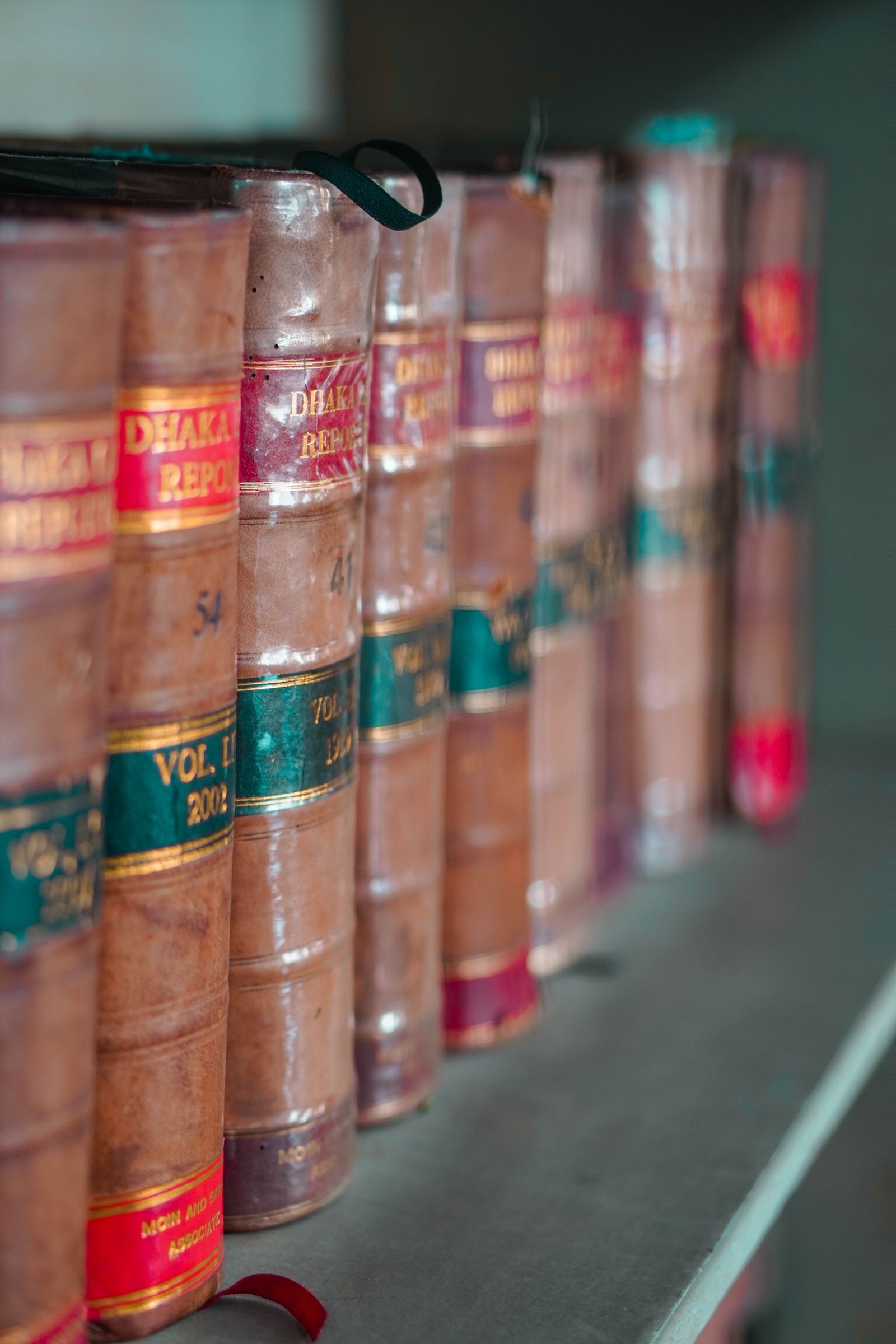 Bound volumes of law reports on the office shelf